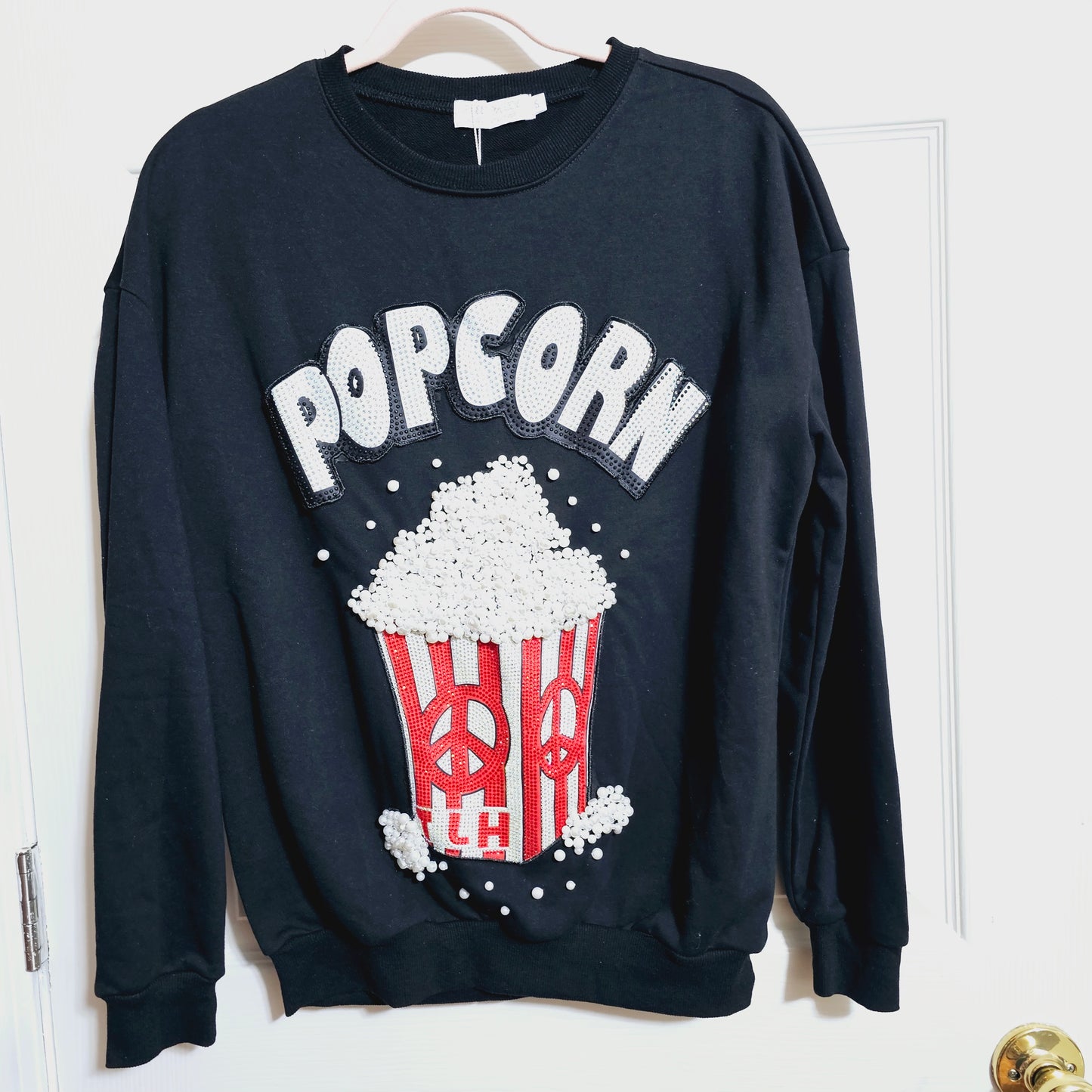 CAMISETA CON MANGA Y DISEÑO DE POPCORN ELABORADO EN PIEDRAS A-1827