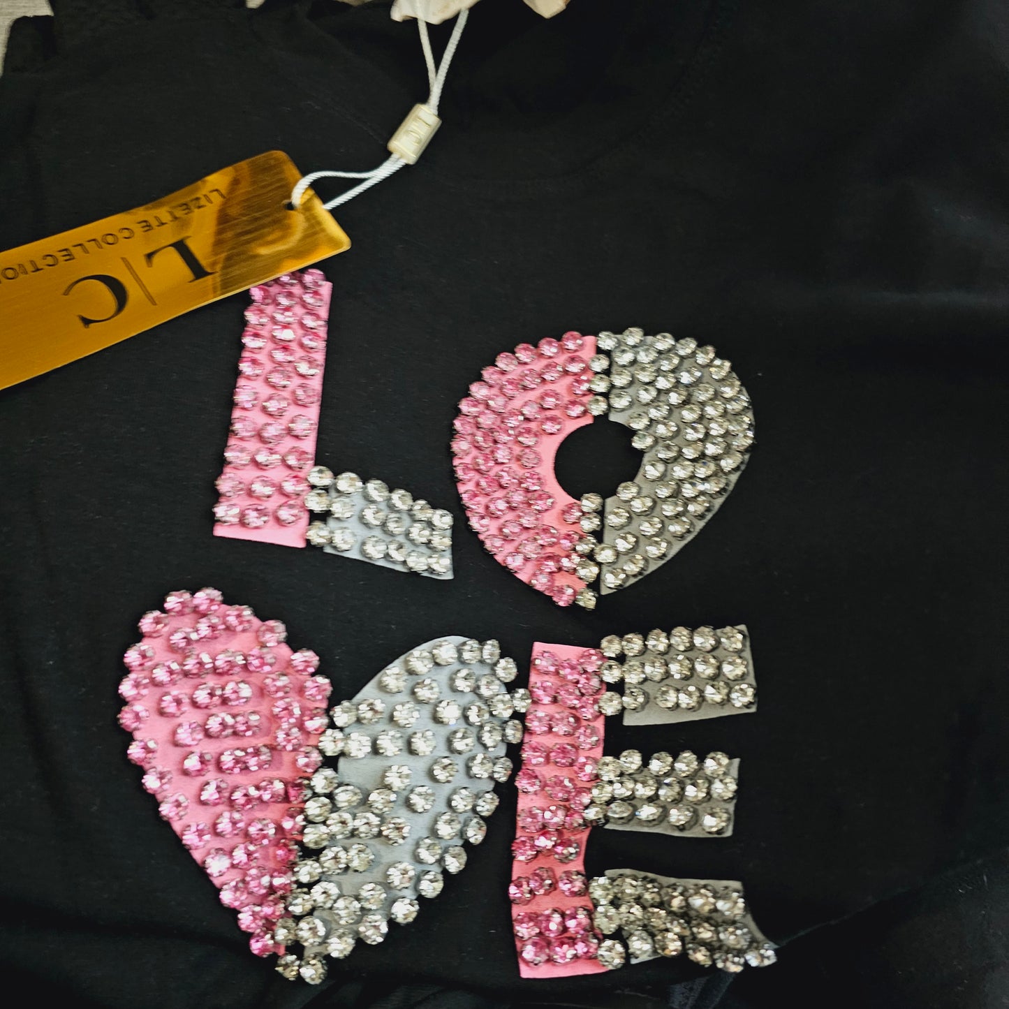 Top camiseta rosa Love con pedreria