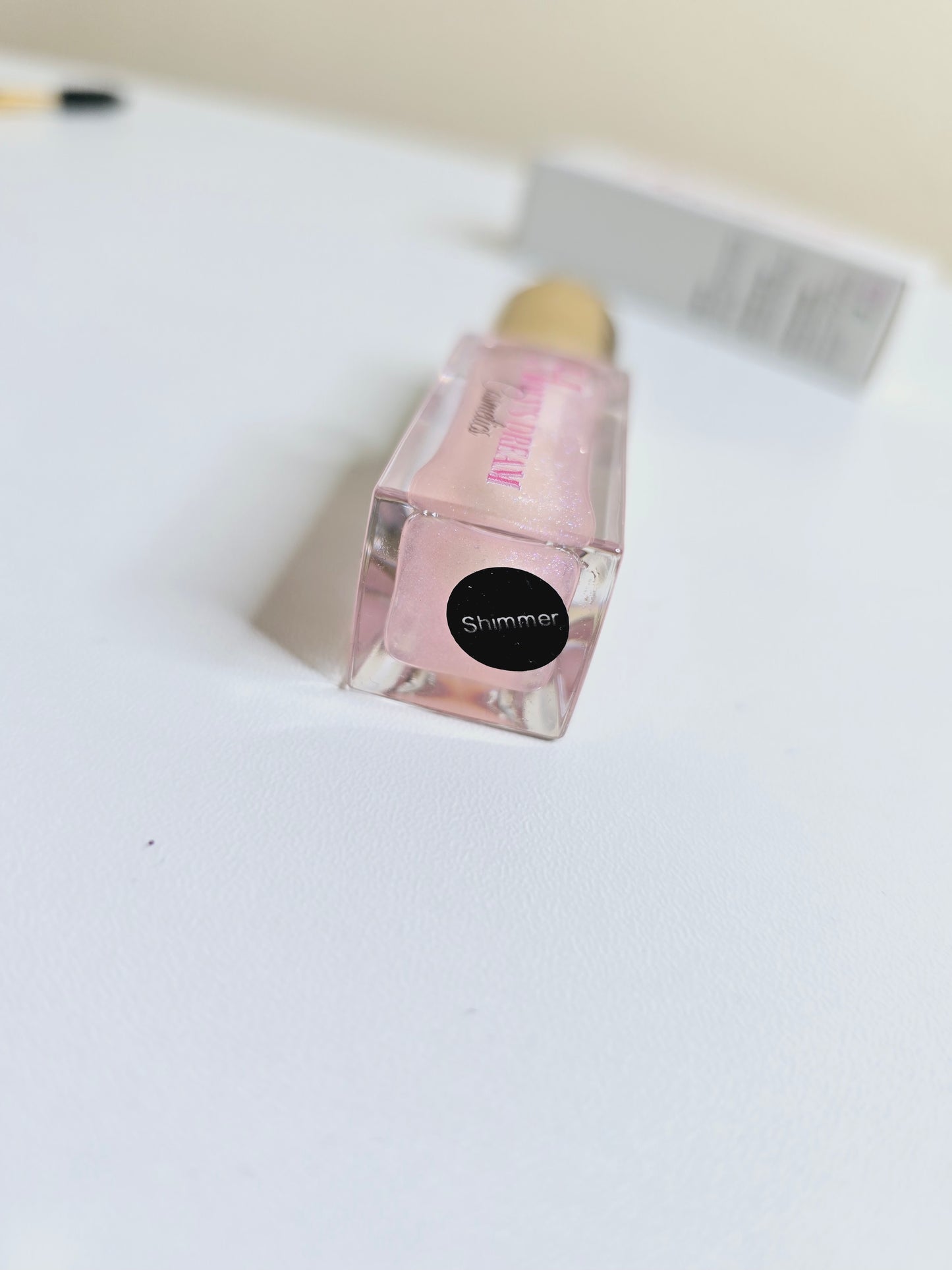 Shimmer Lip Oil filler effect