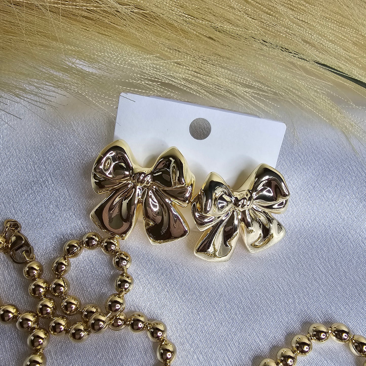 Earring | High quality laminated gold large bow earring AR0029